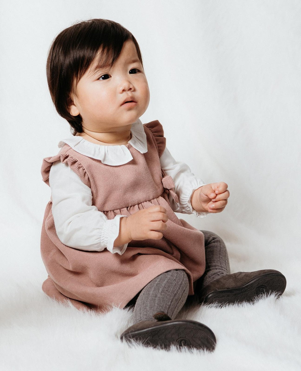 Vestitito in microvelluto a coste rosa e bianco