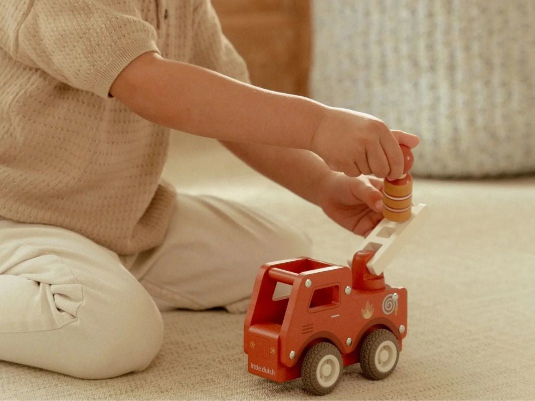 Camion dei pompieri con personaggio