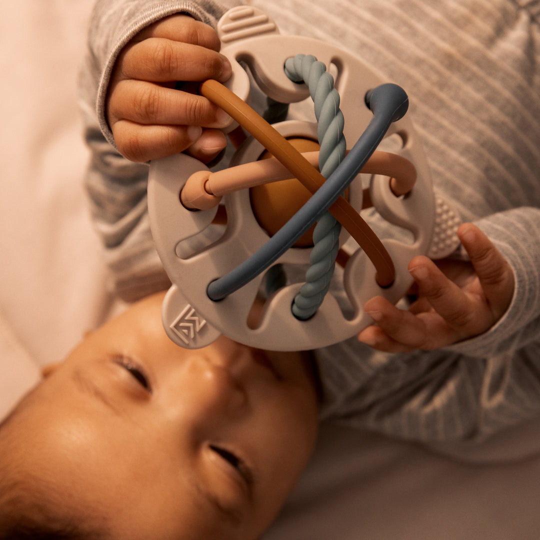 Palla sensoriale e massaggiagengive Hakim - In silicone - 0m+