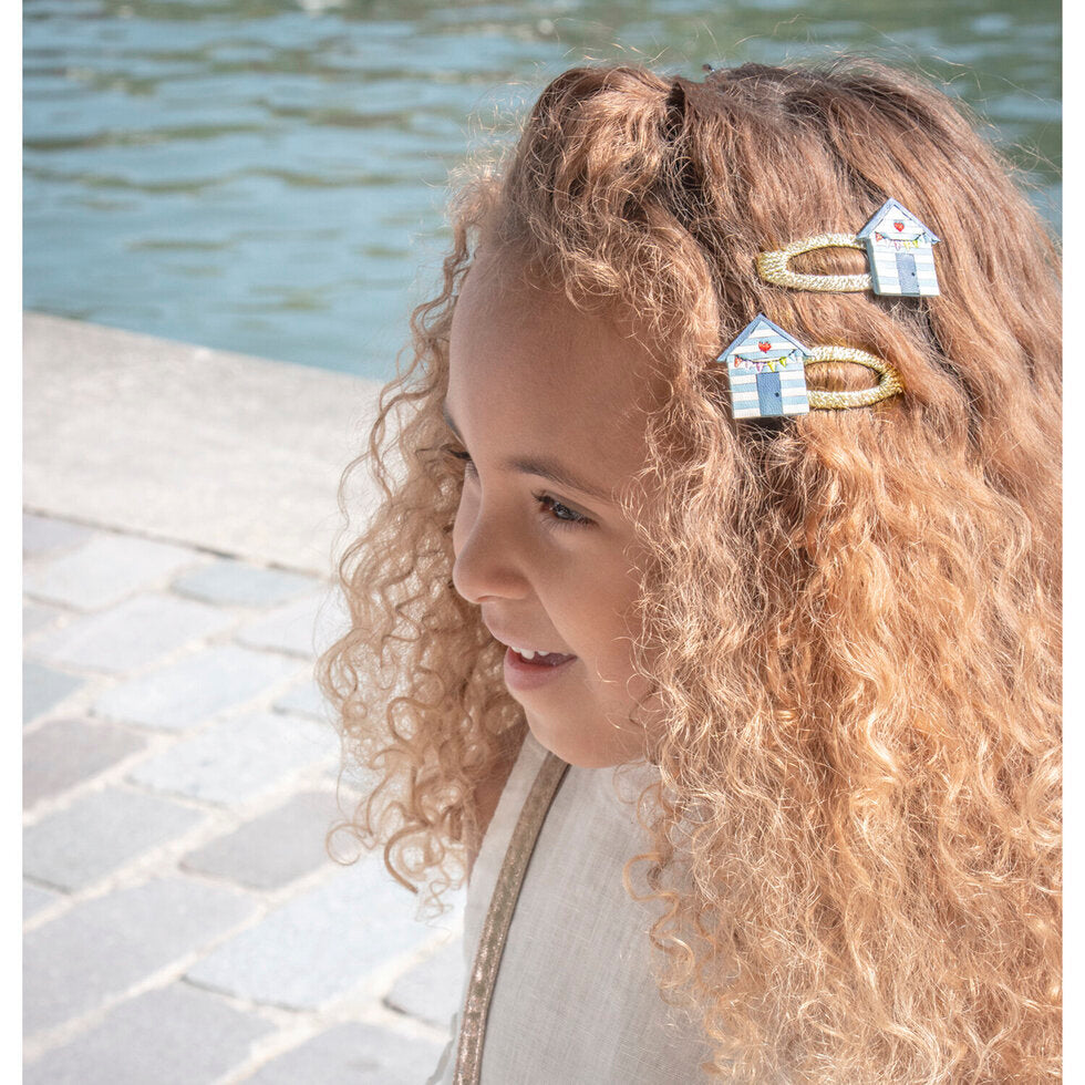 Fermagli per capelli capanna sulla spiaggia