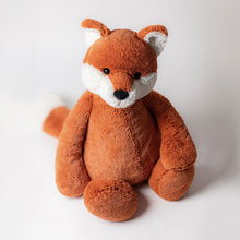 Peluche morbido volpe arancione timida