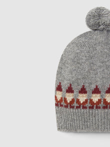 Berretto lavorato a maglia jacquard con pompon